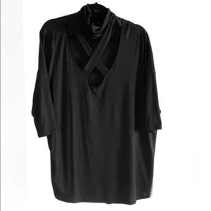 Black shirt with cross-cross neck. Size XL